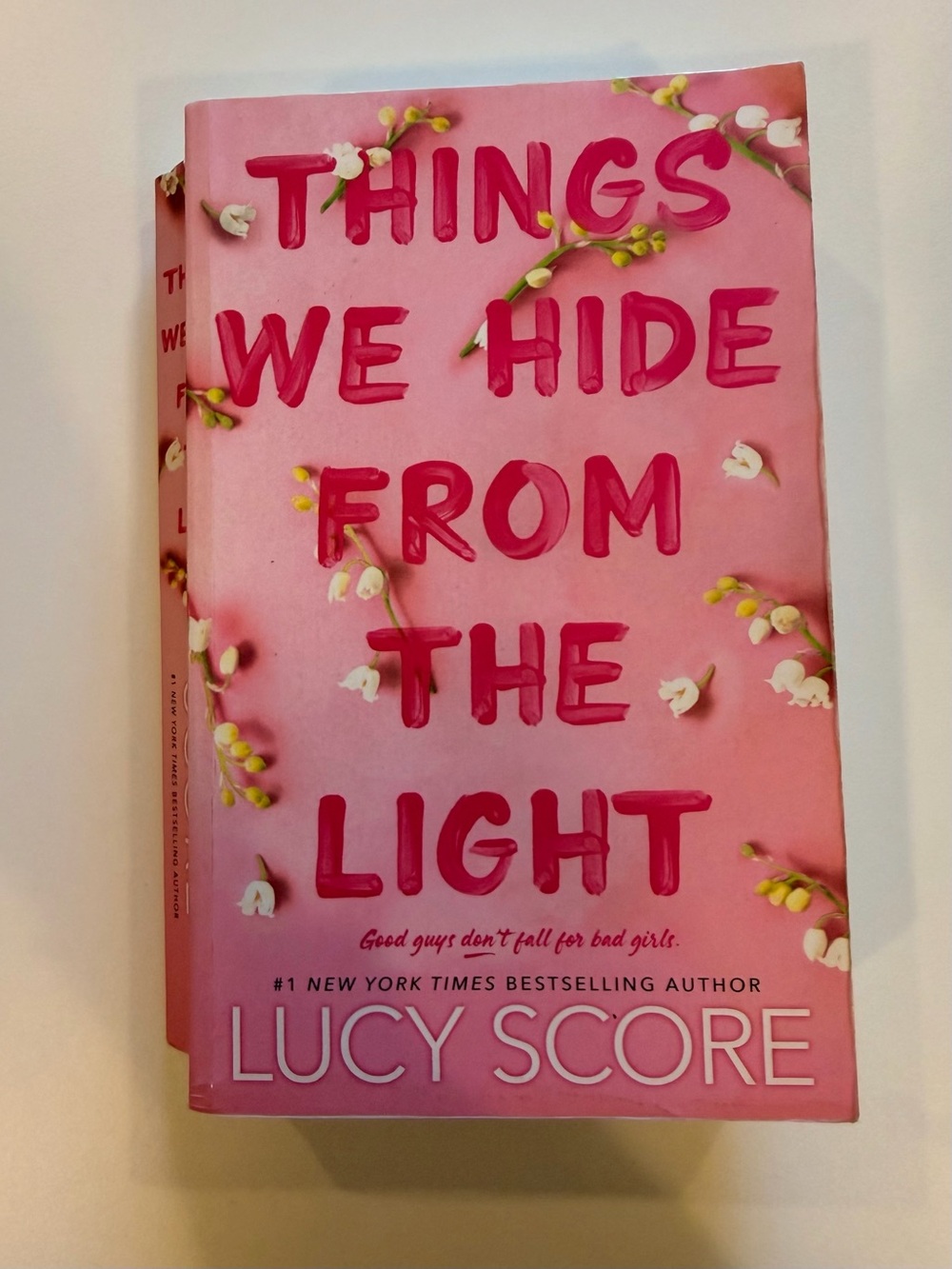 Things We Hide From The Light by Lucy Score - Pink Cover